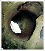 Photo of potholed marked boulder in the Niagara Glen